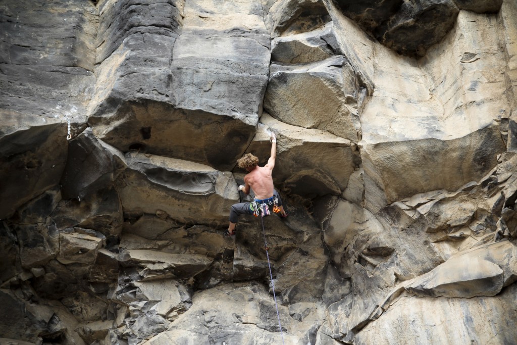 Moving into the lower crux on Soloflex (5.12c)