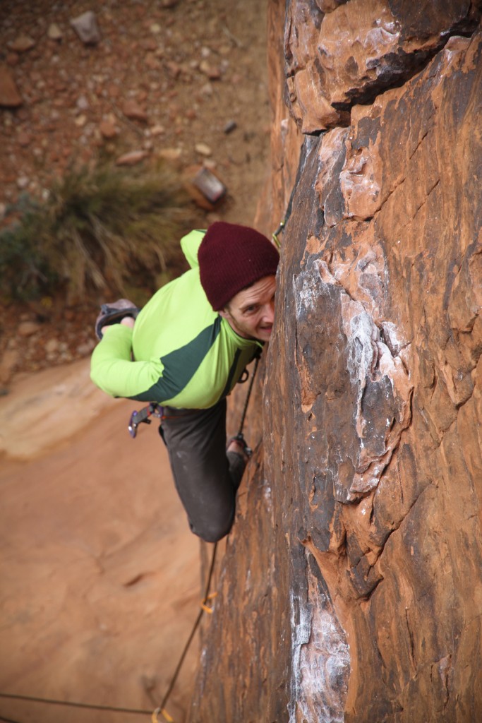 Ben on Gift Rapped (5.11a) Holiday Wall.