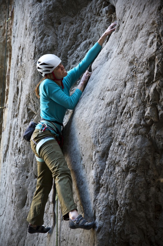 Dana mid crux on an Unknown bouldery 5.12a/b at The Grail. 