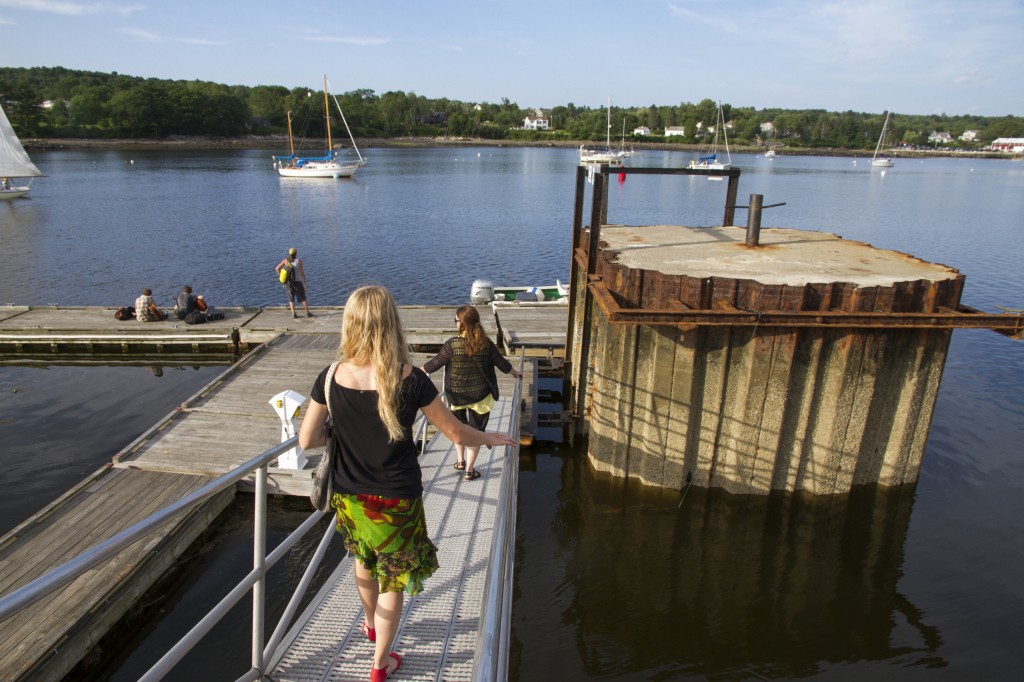 Strolling to the docks to watch sailboats float by.