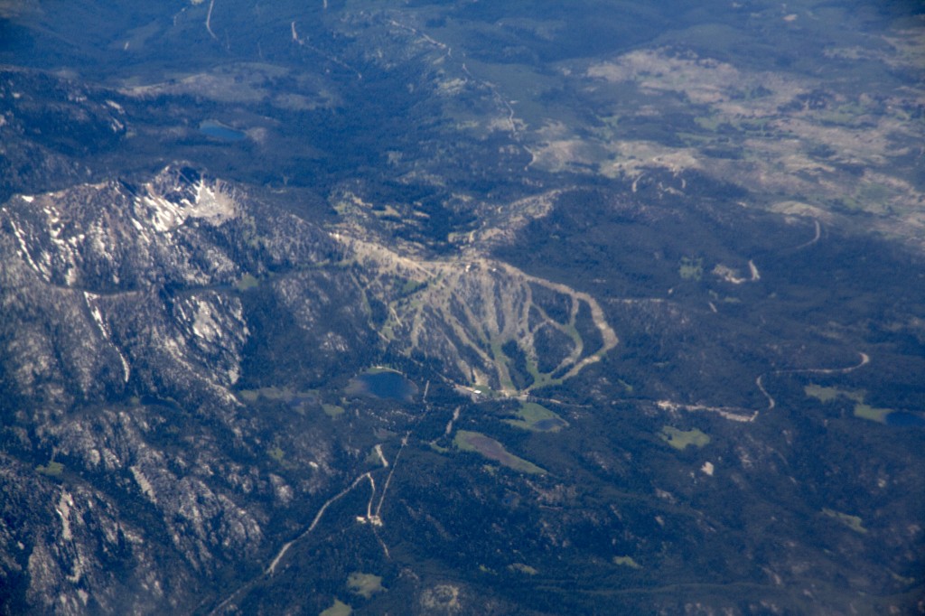 This was a real treat. I was looking out the window on our flight from Seattle to Boise thinking that I might be able to recognize some of the mountain ranges (Wallowas, Elkhorns etc) after living in the area most of my life. As I was convinced I was in the Baker Valley loandbehold I spotted Anthony Lakes!! I grew up skiing this one lift mountain from ages 12-18. Such a cool sight from the air. Gunsight peak to the left, Anthony Lake at the bottom and you can even spot the old lodge. 