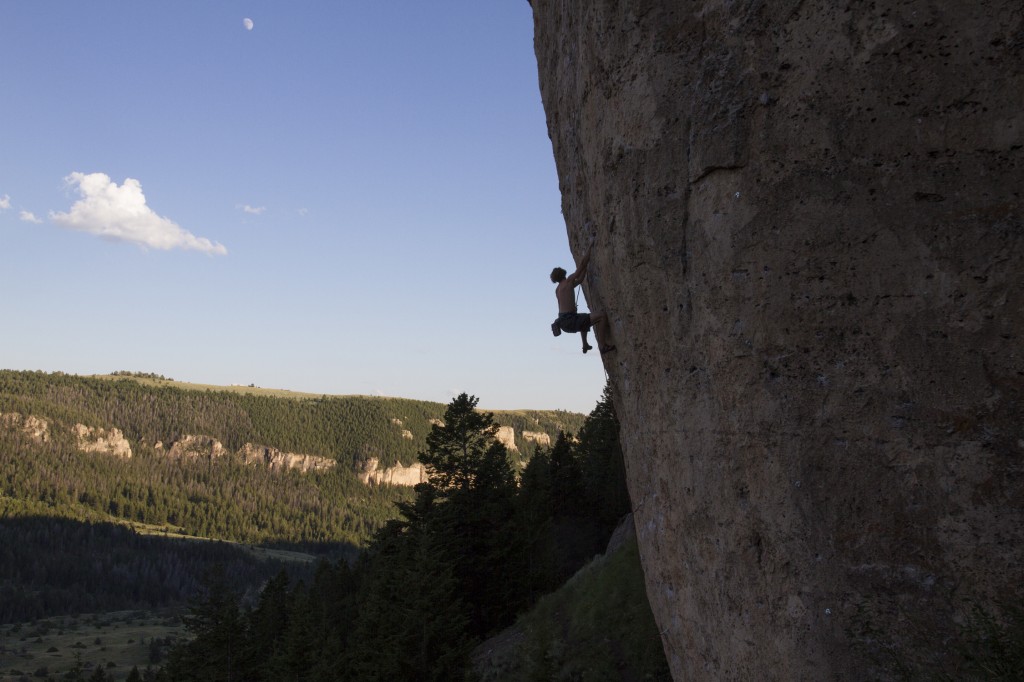 Happiness in Slavery (5.12b) with the endless dolomite of Ten Sleep tracing the canyon walls. Good climbing temps are from about 1:30 PM till dark during July. Often we were treated to a stunning orange and pink light show on the opposite side of the canyon as we hiked out. 