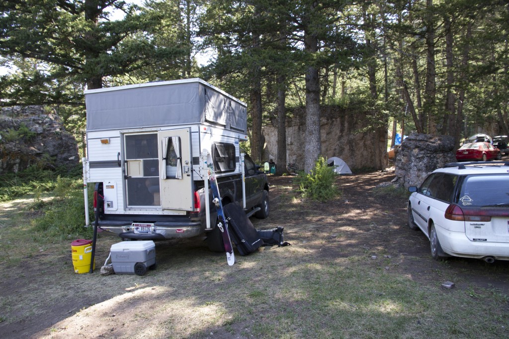 Pete's camper and our tents all up against a sweet boulder. We later moved to a camp up the road a bit more that was SWEET! Lots of room, a creek and cooler temps. Camping near the crag is plentiful, free and beautiful.