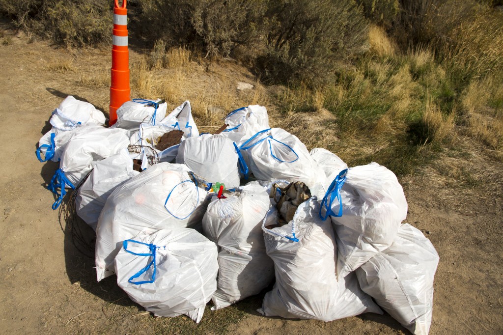 Trash, trash, and more trash! You wouldn't have guessed we could haul this much outta the surroundings of Dierkes Lake in just a few hours! One of our contributions was a traffic pylon left on a ledge mid route at The Prow.