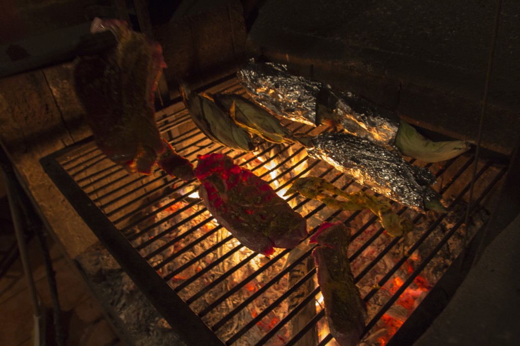 Meat and chewy corn. Christmas dinner over a wood fired BBQ in Nuevo Leon, Mexico. 