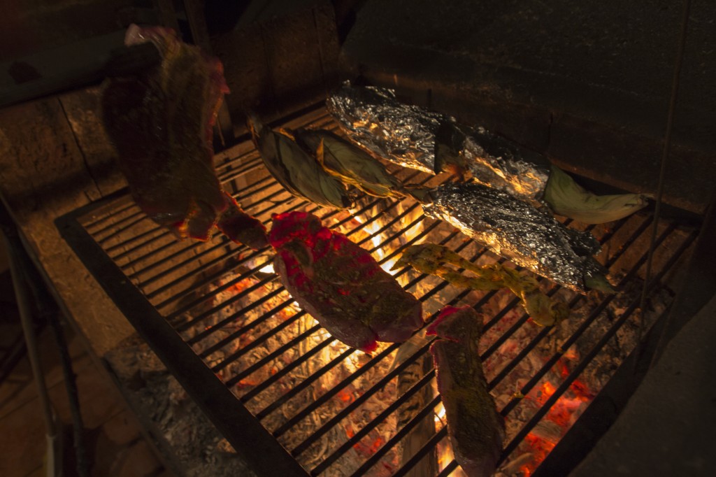 Meat and chewy corn. Christmas dinner over a wood fired BBQ in Nuevo Leon, Mexico. 