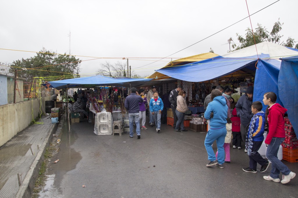 The Thursday Market, where you can get all things from light bulbs to porn. Some of the trees along this street have had so many lines tied off to them over the last hundred years that they have grown in this strange hourglass shape. 