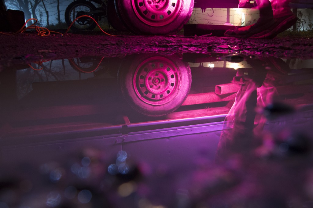 Possibly my favorite shot of the trip. Reflection of Edguardo's trailer, techno bumping, disco lights, and the alley that we took the 2014 shot (upper left). 