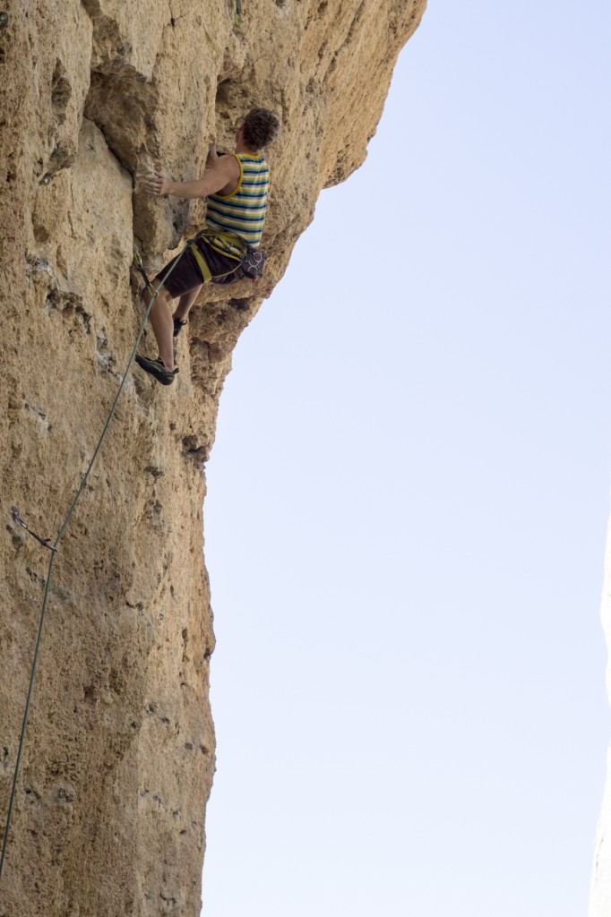 The face on his way up July Jihad (5.12b).