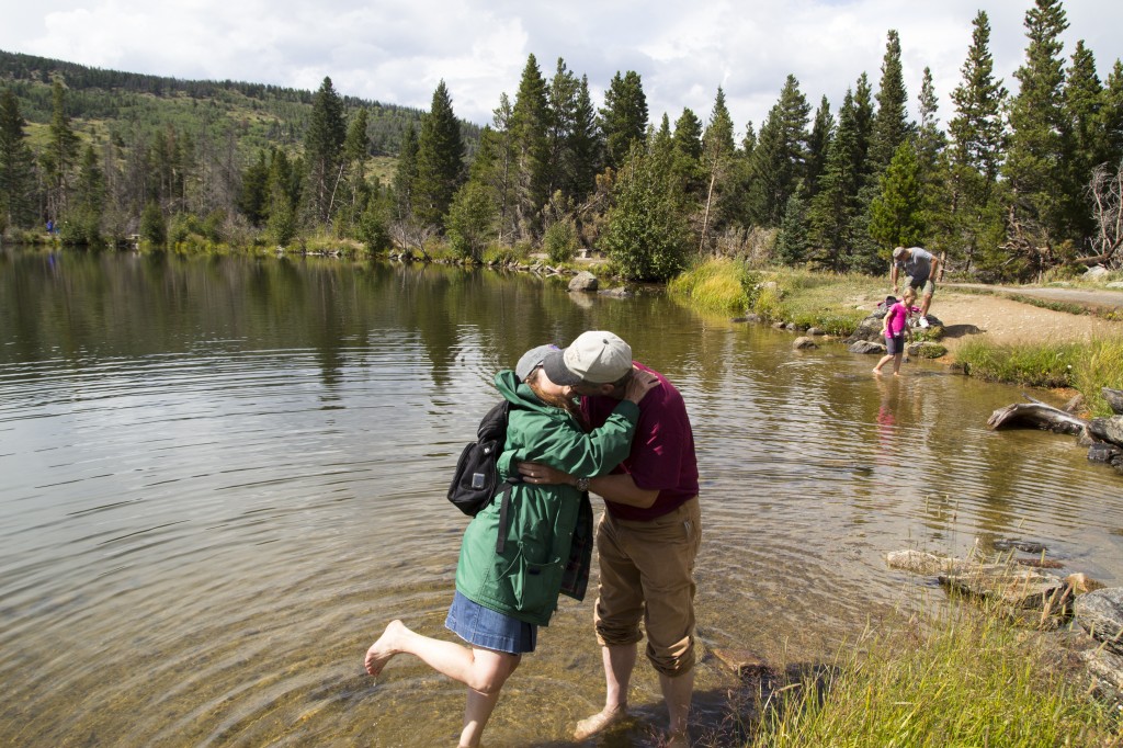 Hippies playing in a lake.