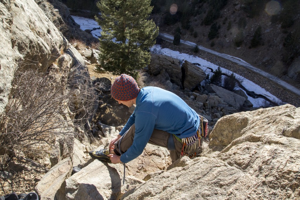 Lacing up for another mileage day. Working on a weakness... slab climbing. 