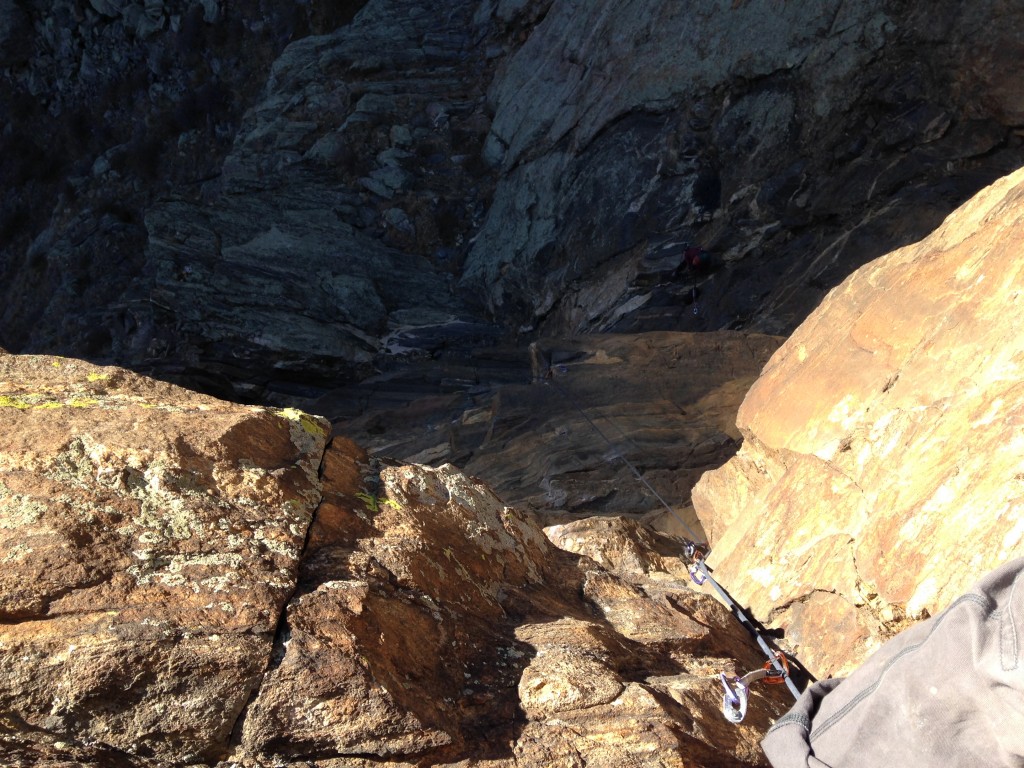 Looking down from the anchors of a super tall 5.10 at Cat Slab.