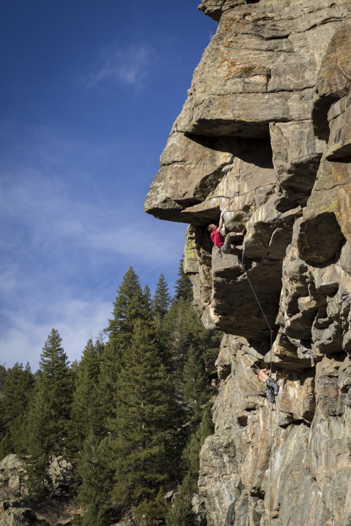 The crux moves on Y2K (5.12c) at the Wall of the 90s in Clear Creek Canyon, CO.