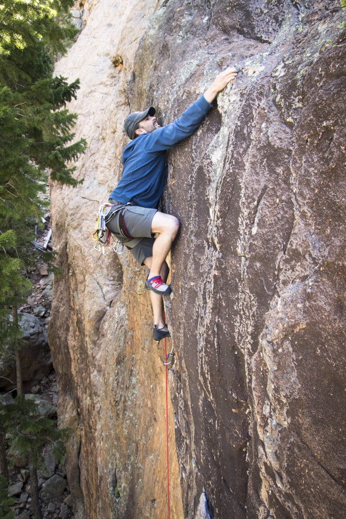 Topping out the crux of No Rain (5.10d) in the Tan Corridor. 
