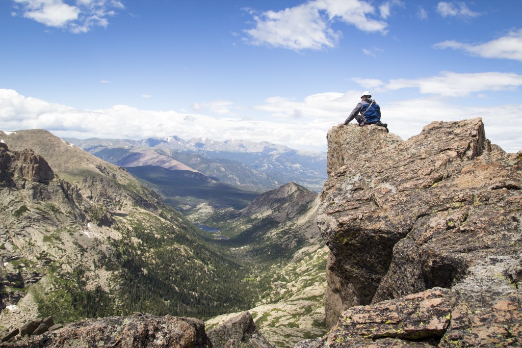 Andy on the true summit, a dinner table sized block that hangs over the whole valley below. 