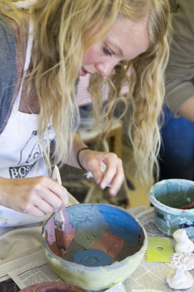 Robyn glazing her bowl. 