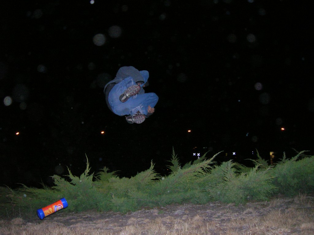 Marcus engaged in our unofficial Idaho sport of "bush diving". Moscow, Idaho 2004.