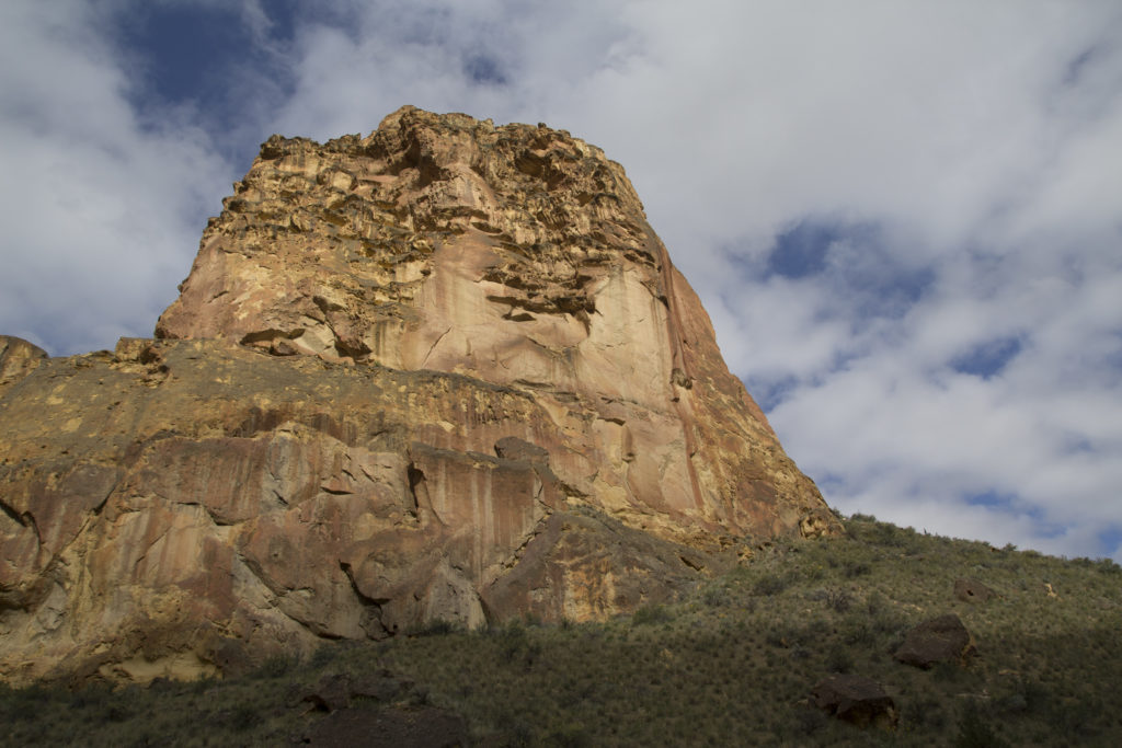 Sun setting on one of the massive untapped walls of Leslie Gulch.